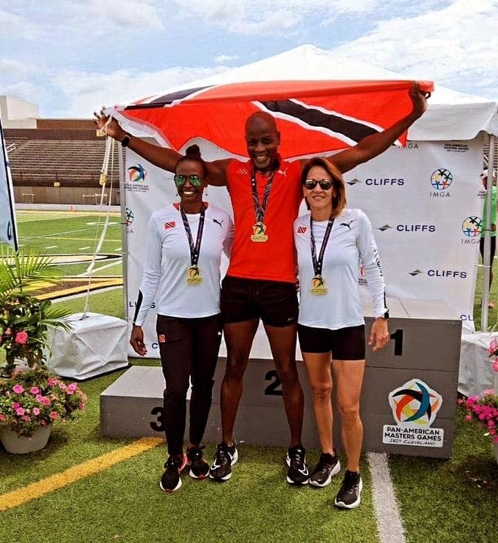 L-R: TT's Michelle Sturge (100m), Murrien Mitchell (100m) and Natasha Kelshall-Pantin (400m) celebrate their golden finishes at the Pan American Masters Track & Field Championship in Cleveland, Ohio. - 