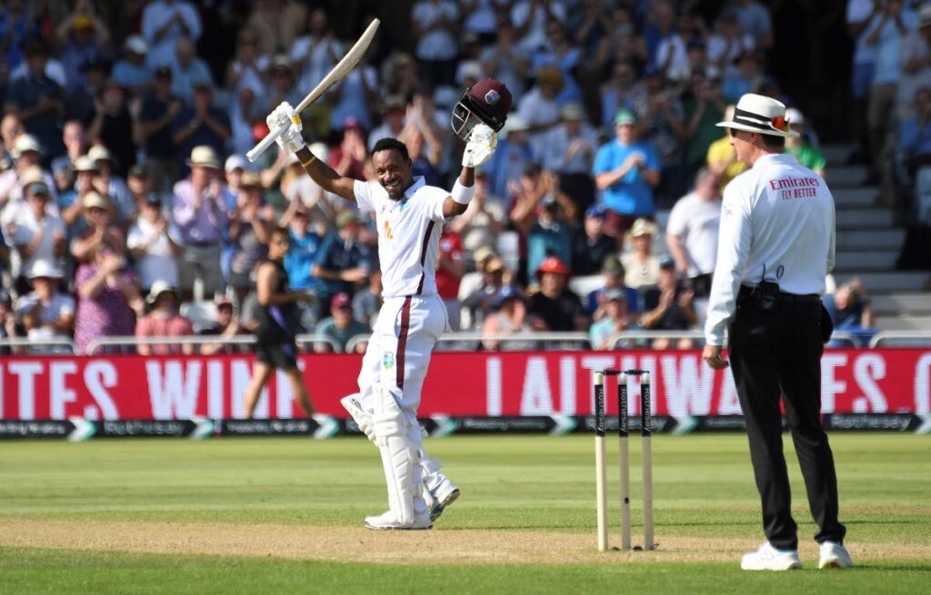 West Indies batsman Kavem Hodge celebrates after scoring a century during day two of the second Test between England and West Indies at Trent Bridge Cricket Ground, Nottingham, England on July 19. - AP PHOTO 