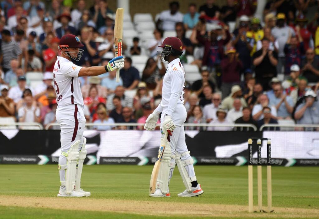 West Indies wicketkeeper/batsman Joshua Da Silva, left, celebrates his half century with Shamar Joseph during day three of the second Test between England and West Indies at Trent Bridge Cricket Ground in Nottingham, England on July 20. AP PHOTO - 