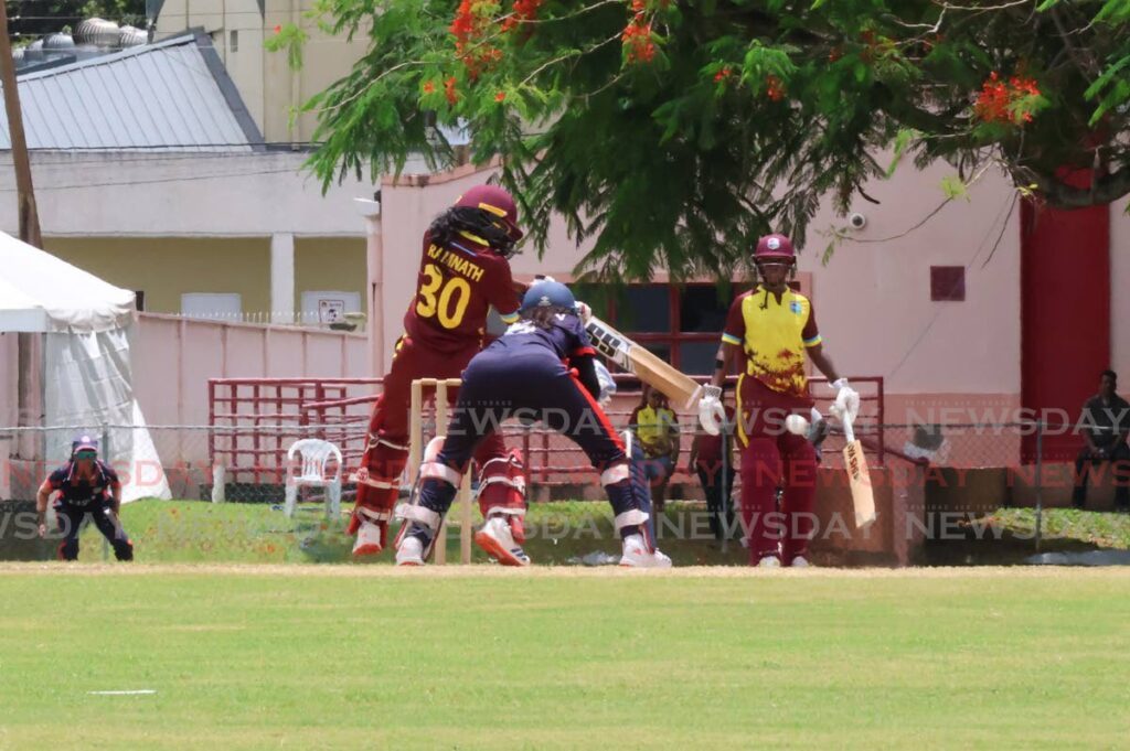 West Indies Under-19 women’s captain Samara Ramnath bats while teammate Jahzara Claxton looks on during the first match of a five-match series against the US, at UWI-Spec, St Augustine on July 20, 2024. - Photo by Roger Jacob