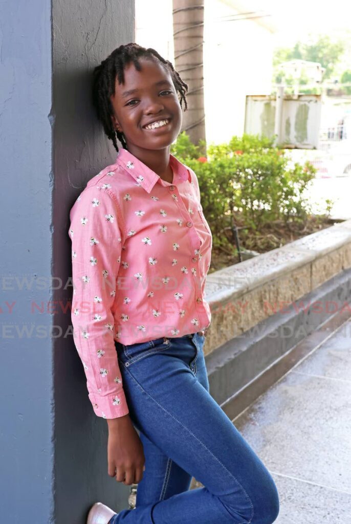 Mikhaela Browne,13, is young artist and Childline ambassador for TT. - Photo by Venessa Mohammed