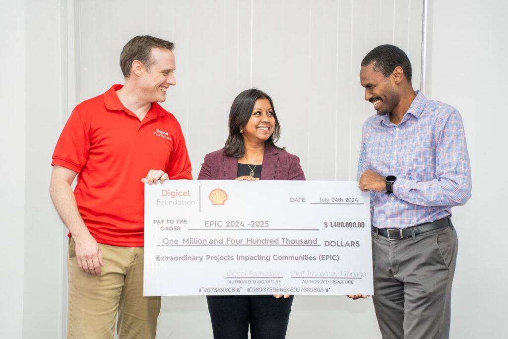 EPIC PARTNERSHIP RENEWED: Abraham Smith, CEO, Digicel TT, left; Desha Clifford, chairperson, Digicel Foundation; and Burt Bushell, work process performance manager, Shell TT. 
Photo courtesy Digicel Foundation.  - 