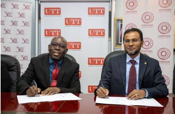 Acting President of UTT Professor Stephen Joseph, and Dr Haydn I. Furlonge, general manager of PowerGen, sign the MoU document at UTT’s Chaguanas Campus on July 5.