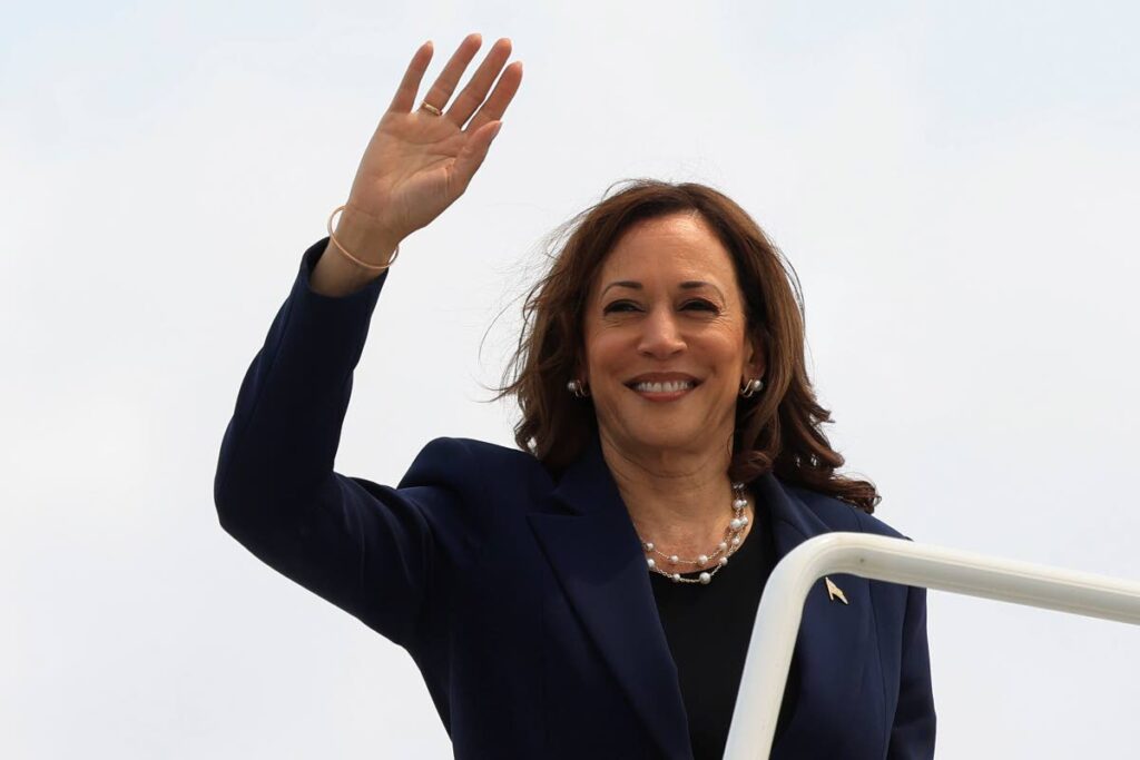 Vice President Kamala Harris waves as she boards Air Force Two following a campaign event, in Milwaukee, Wisconsin, on July 23. - AP PHOTO