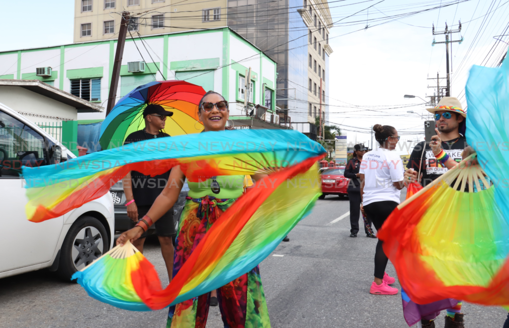 People enjoy themselves during the Pride parade on Maraval Road, Port of Spain, on June 28