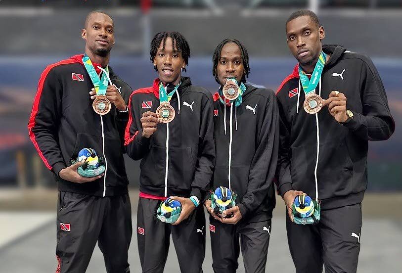 TT 3x3 men's basketballers, from left, Chike Augustine, brothers Ahkeel and Ahkeem Boyd, and Moriba de Freitas with their 2023 Pan Am Games bronze medals in Santiago, Chile.  - 