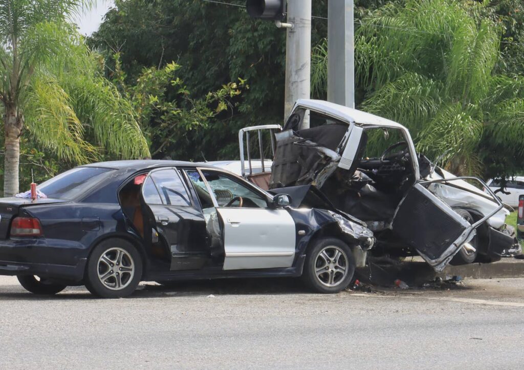 These two vehicles were involved in an accident at the Cumuto Intersection of the Churchill Roosevelt Highway, Wallerfield, in February. - File photo by Roger Jacob