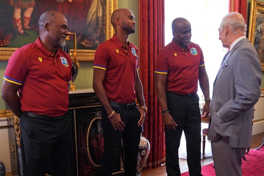 Britain's King Charles III meets the West Indies men's cricket team, from left: coach Andre Coley, captain Kraigg Brathwaite and manager Rawl Lewis, at Buckingham Palace, London, ahead of the first Test against England, on Saturday. AP PHOTO, File - 