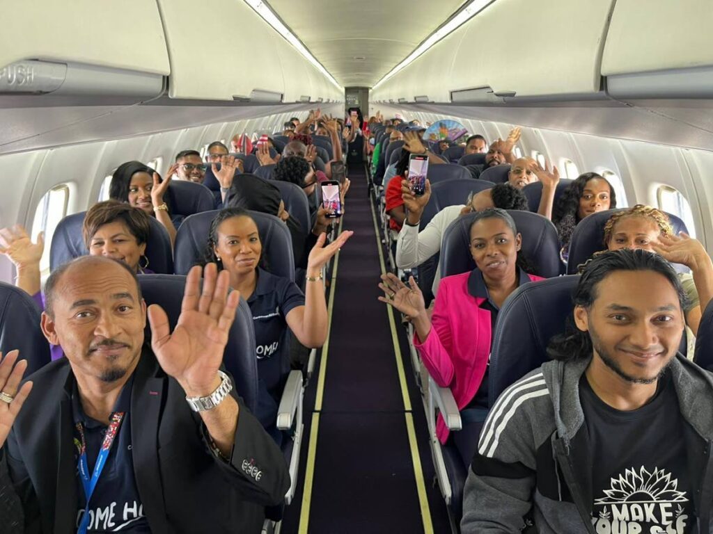 Passengers on board CAL's inaugural flight BW290 to San Juan, Puerto Rico, on July 14.  - - Photo courtesy CAL 