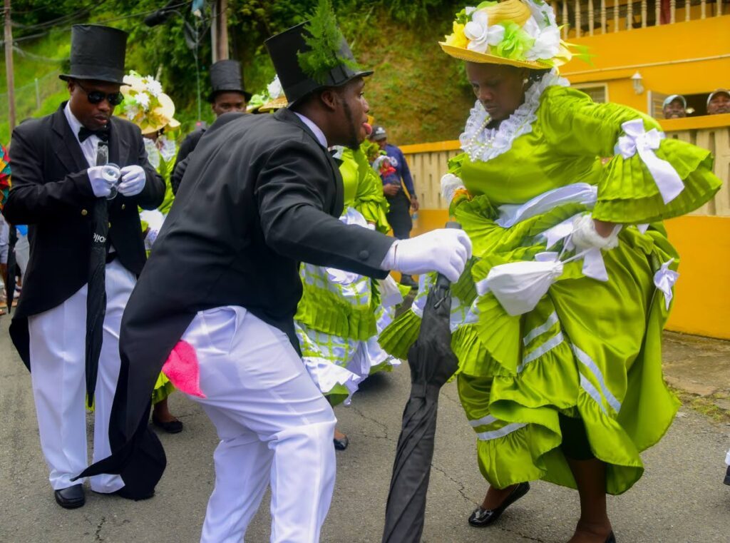 Dancers take part in a procession for the bride and groom along the streets of Moriah on July 20. Recreating the ole time wedding is a highlight of the Tobago Heritage Festival calendar.
 - Photo courtesy Visual Styles