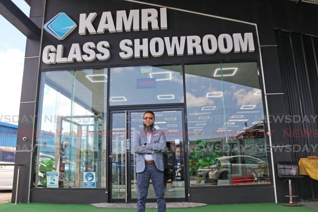 Kameel Khan, owner of Kamri Glass on Battoo Avenue, Marabella. - Photo by Lincoln Holder 