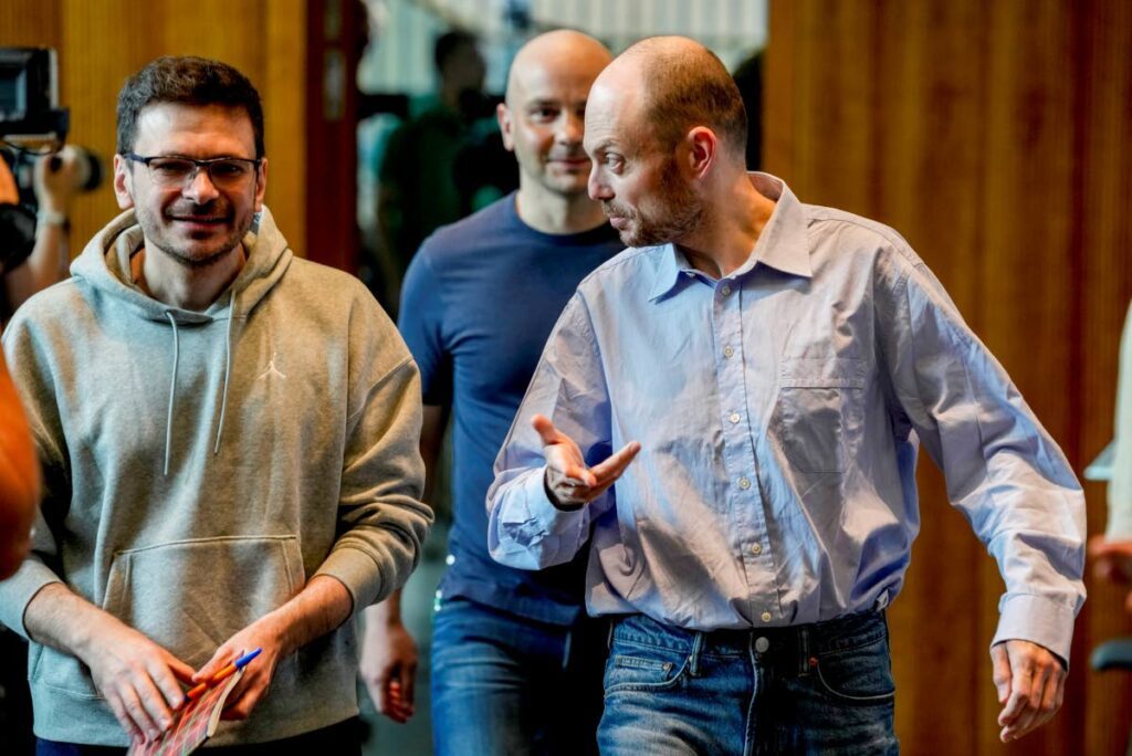 Freed Russian prisoners Ilya Yashin, left, Andrei Pivovarov and Vladimir Kara-Murza, arrive at a press conference in Bonn, Germany, on August 2, a day after they were released as part of a 24-person prisoner swap between Russia and the US.  - AP PHOTO