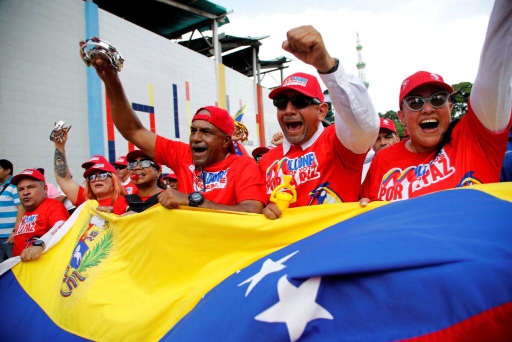 Supporters of Venezuelan President Nicolas Maduro take part in a rally in defence of his re-election, in Caracas, Venezuela, on August 3. - AP PHOTO