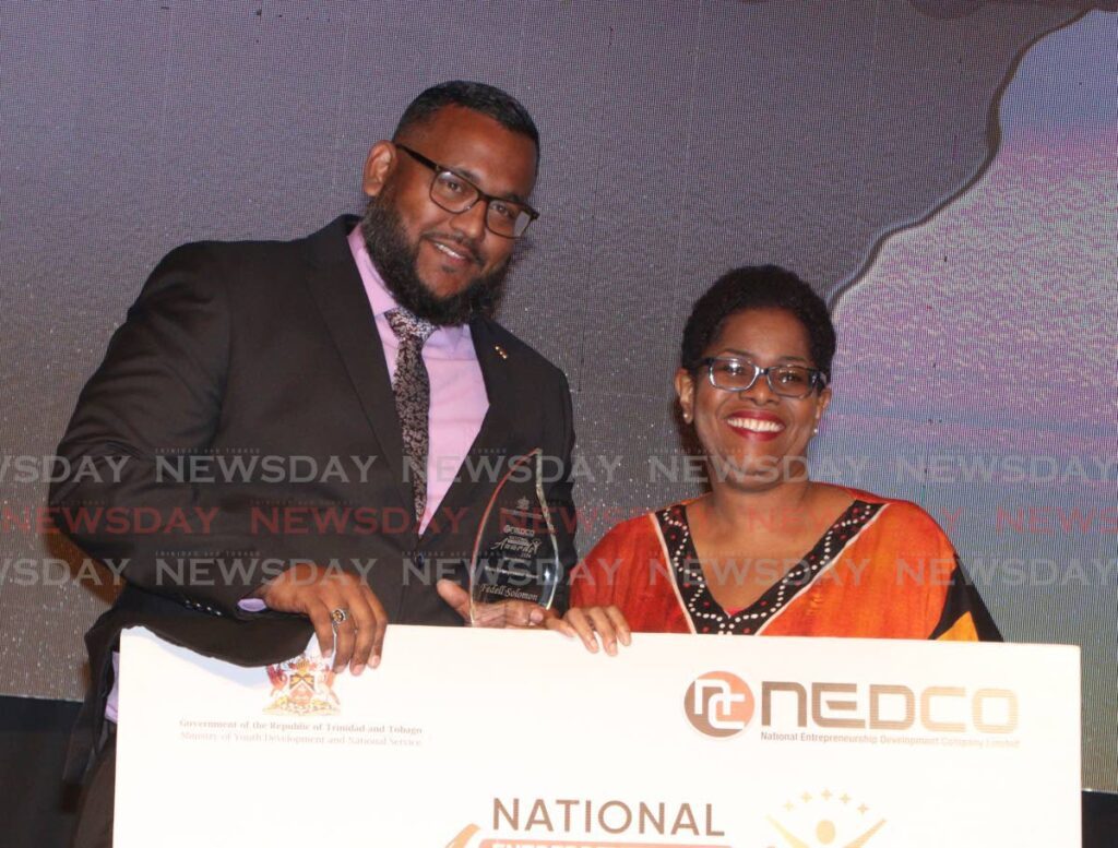 Newsday editor in chief Camille Moreno presents Fedell Solomon, winner of Nedco's 2024 Male Entrepreneur prize at Nedco's National Entrepreneurship Awards ceremony, Hyatt Regency, Port of Spain on August 3. - Photo by Angelo Marcelle