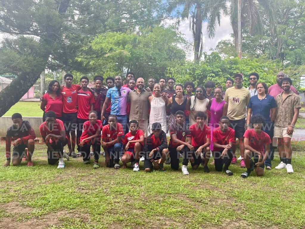 St George's College footballers with members of staff and sponsors at the school compound on July 30.  