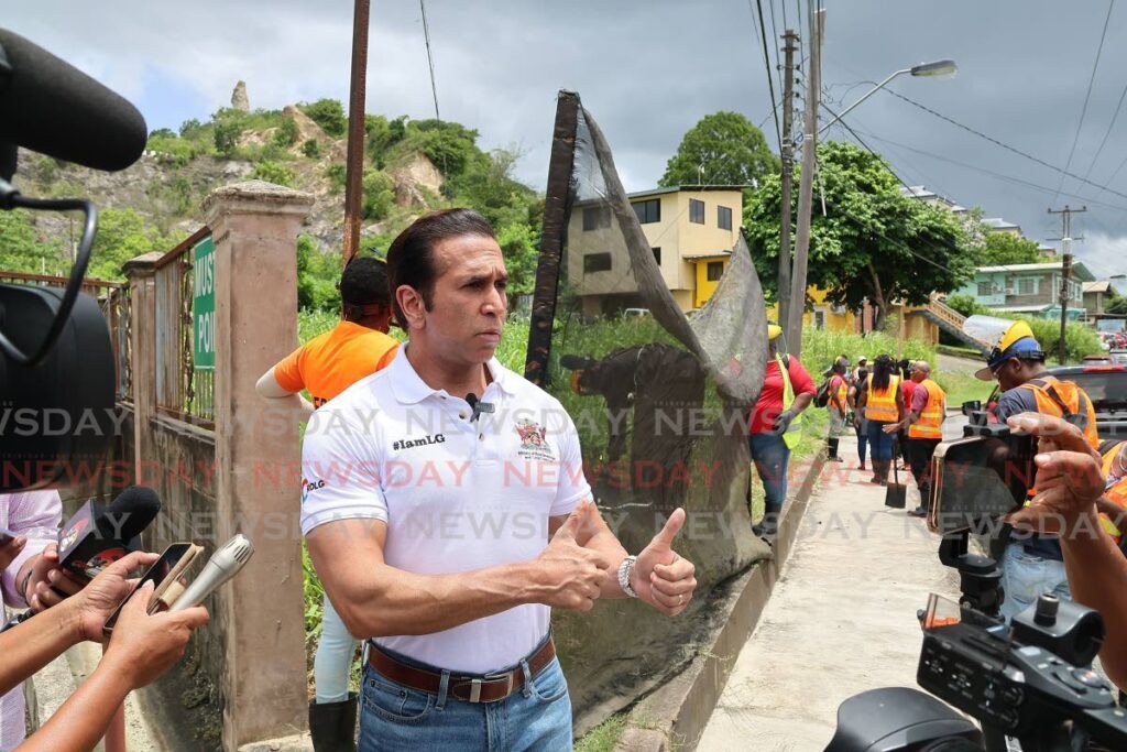 Minister of Rural Development and Local Government Faris Al-Rawi speaks to reporters about the ministry's Cut and Clear Initiative to combat dengue in communities at the Disaster Management Building, Circular Road, San Fernando on August 7. - Photo by Lincoln Holder