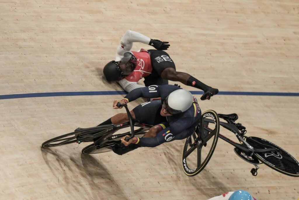 Trinidad and Tobago's Kwesi Browne crashes during the men's keirin event at the 2024 Olympics on August 10. TT Cycling Federation (TTCF) president Rowena Williams said Browne was 