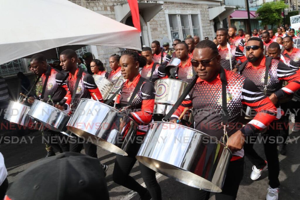 The TT Defence Force Steel Orchestra accompanied the procession during the ancestral walk.  - Roger Jacob