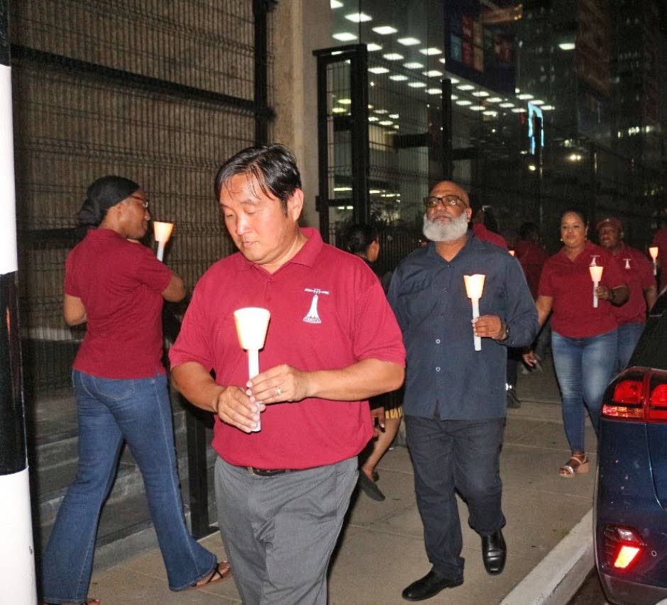 TTUTA president Martin Lum Kin leads a vigil outside the Ministry of Finance, Port of Spain, on August 12 to highlight a delay in payment of $33.1 million in medical claims to teachers. - Photo courtesy TTUTA