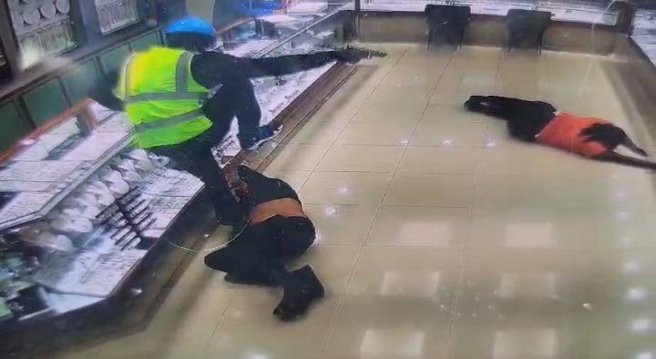 A screengrab of a video showing a bandit stomping a worker at Caribbean Jewellers, Lowlands Mall, Tobago.  - 