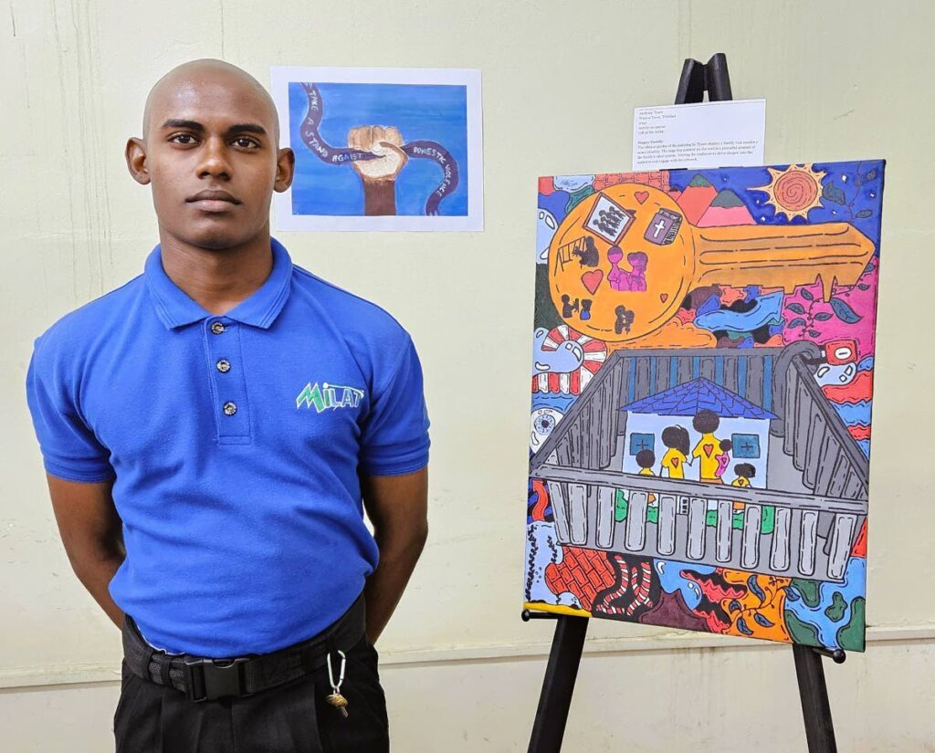 MiLAT trainee Anthony Tyson and his artwork Happy Family, in which the factors of a happy family are etched into the bow of a golden key.
 - Photo courtesy MiLAT