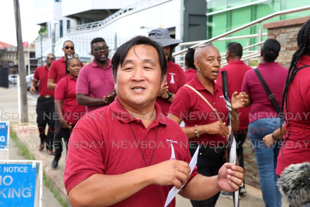 TTUTA president Martin Lum Kin speaks during a protest for delayed medical claim payments  outside the Chief Personnel's Officer's office, Alexandra Street, Port of Spain, on August 15. - Photo by Ayanna Kinsale