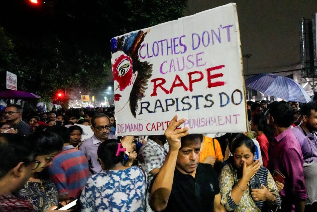 Students join other protesters in a midnight rally on Wednesday protesting against the murder of a 31-year-old post-graduate trainee demanding proper investigation in Kolkata, India. AP PHOTO - 