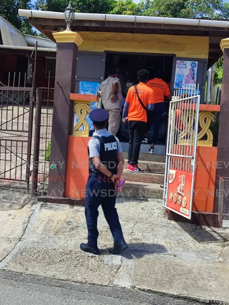 Police officers from the Central Division completed a walkabout in Couva and Gran Couva on August 16. - Photo by Laurel Williams