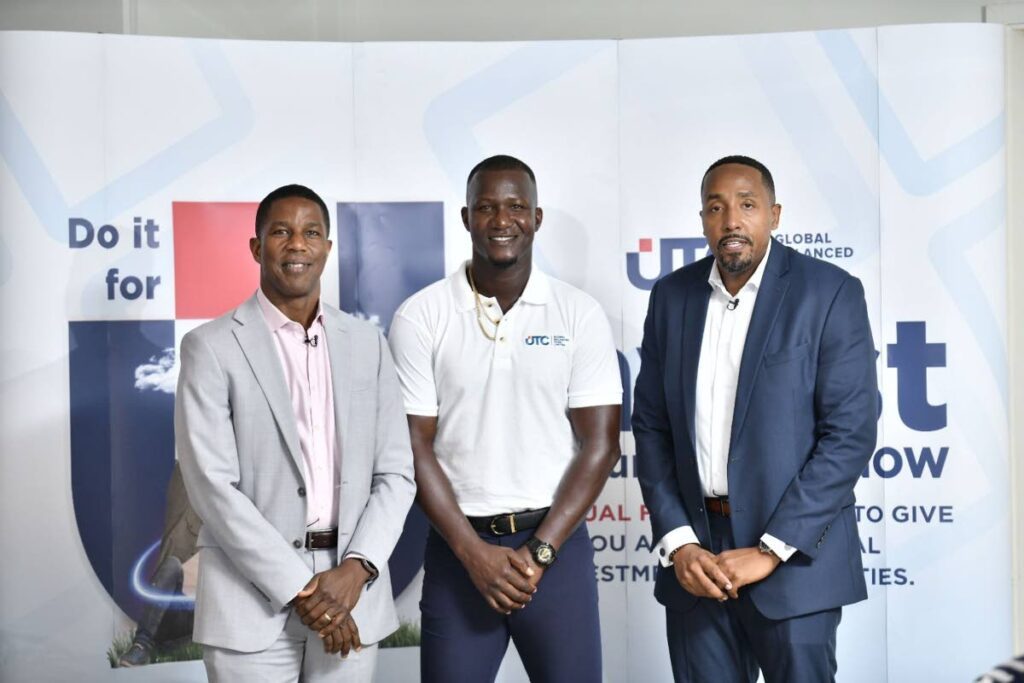 TT Unit Trust Corporation (TTUTC) executive director and UTC GBFL director Nigel Edwards, left; Omar Burch-Smith, regional collective investment scheme manager, UTC Fund Management Services STL Ltd, right; welcome former West Indies captain Daren Sammy as UTC’s GBFL brand ambassador. - 