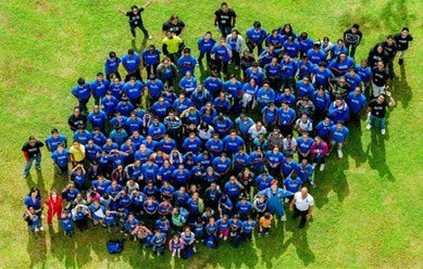 Aerial shot of 2013 STEM students taken from the Piarco Control Tower with Captain Judy and Dr Bradner. 
Photo courtesy Ramesh Lutchmedial. - 