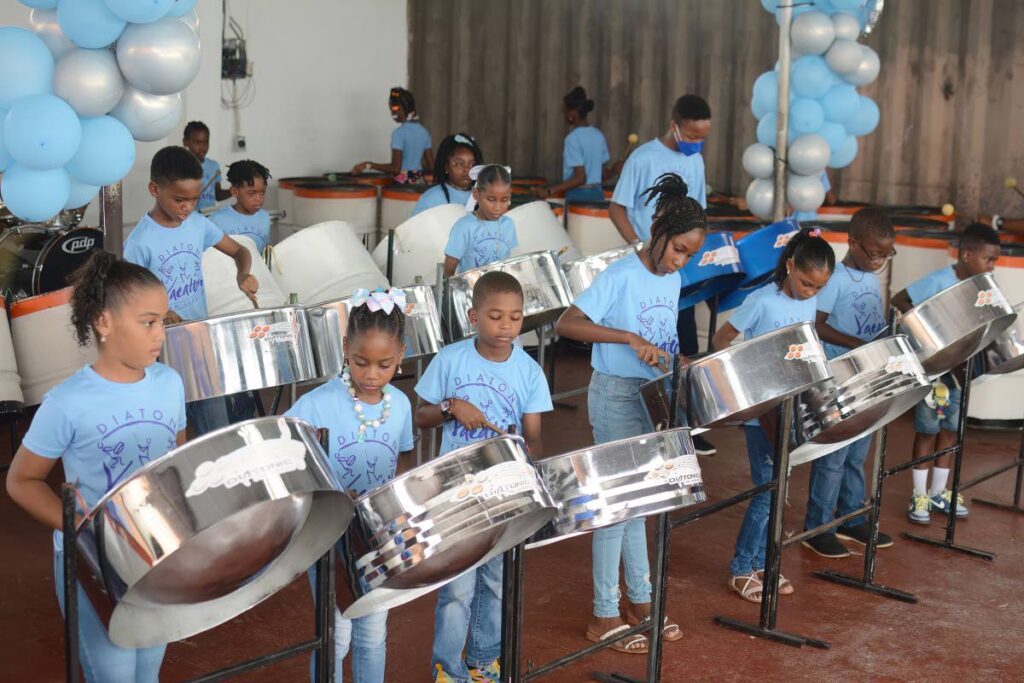 Participants learn to play the steel pan. - Photo courtesy new Era Entertainment