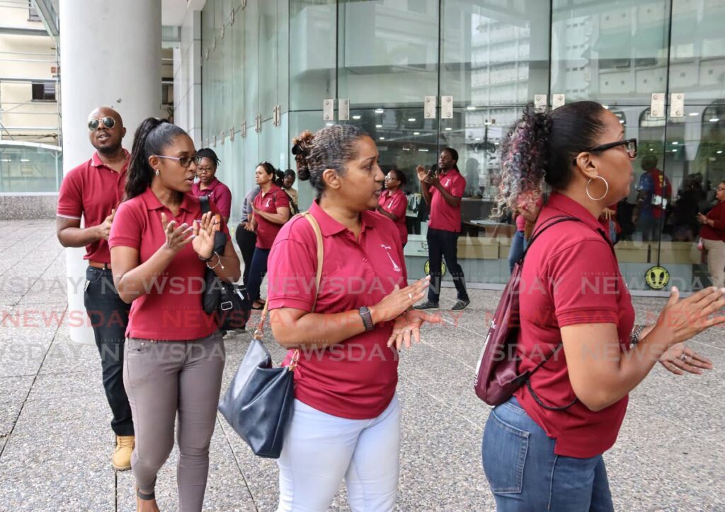 Members of the Trinidad and Tobago Unified Teachers' Association (TTUTA) protest outside of the Ministry of Education, St. Vincent Street, Port of Spain, on August 27. - Gabriel Williams 