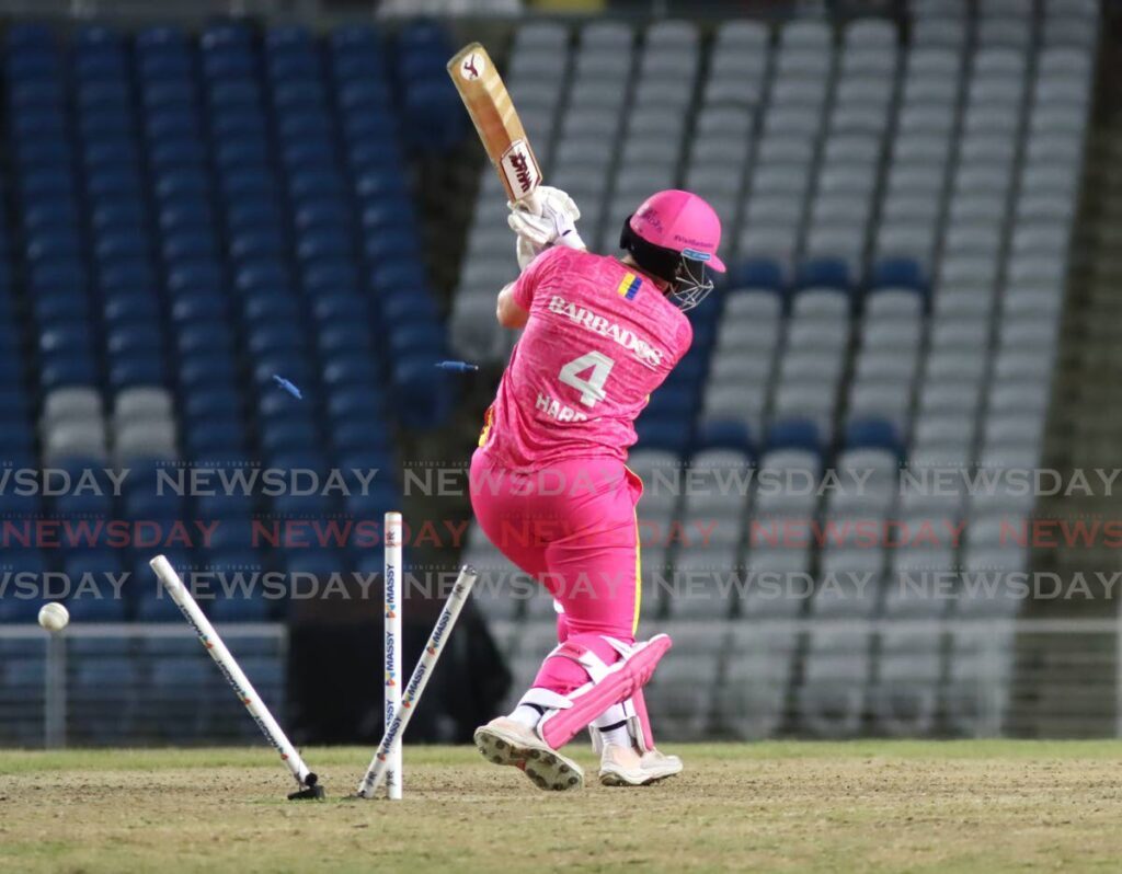 Barbados Royals batter Laura Harris is bowled by fast bowler Shabnim Ismail.