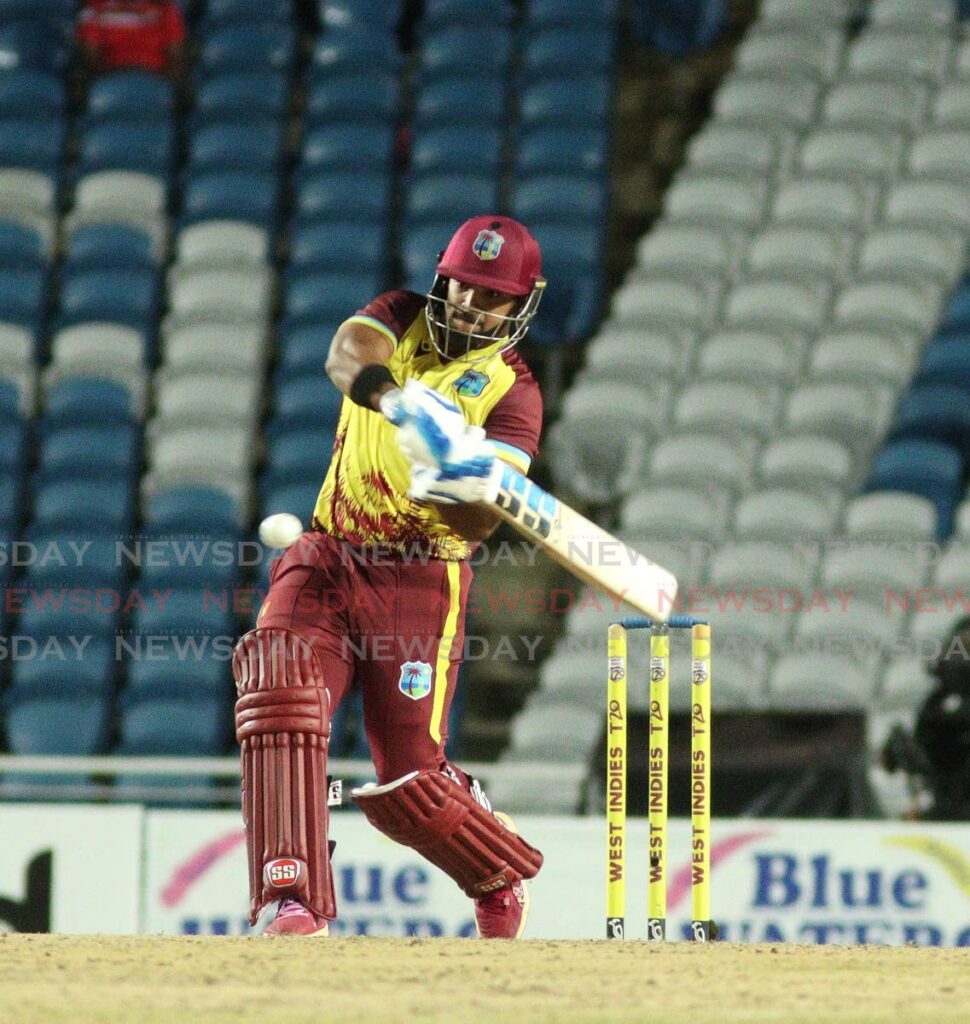 West Indies batsman Nicholas Pooran plays a shot on the leg side. - Photo by Angelo Marcelle