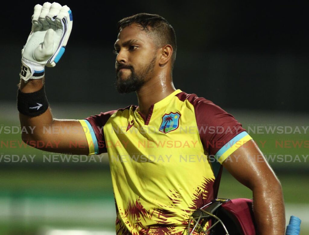 West Indies batsman Nicholas Pooran acknowledges the applause of fans after his knock against South Africa in the third T20 on August 27 at the Brian Lara Cricket Academy, Tarouba. - File photo by Angelo Marcelle