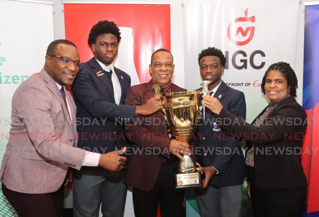 From left, David Roberts, acting permanent secretary, Ministry of Sports and Community Development; Fatima College defender Yohance Atherton; president of the Secondary School Football League (SSFL) Merere Louis Gonzales; Fatima College midfielder Jedaiah King; acting permanent secretary, Ministry of  Education Simone Wiliams, at the SSFL launch at The Brix St Ann's, Port of Spain on August 28. - Photo by Faith Ayoung