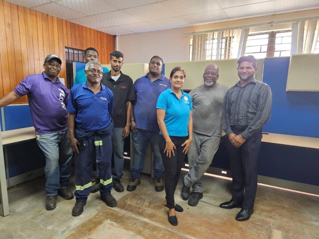 Flow team members who assisted in the delivery and installation of the furniture at the  National Centre for Persons with Disabilities (NCPD). At right is NCPD's  chief operating officer Ricardo Rampaul. - Photo courtesy Flow