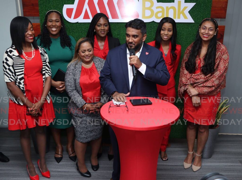 Jamaica Money Market Brokers Ltd (JMMB) TT country CEO and JMMB Bank CEO Shawn Moses, introduces the staff at the official opening of its High Street, Princes Town, branch on August 29. - Angelo Marcelle