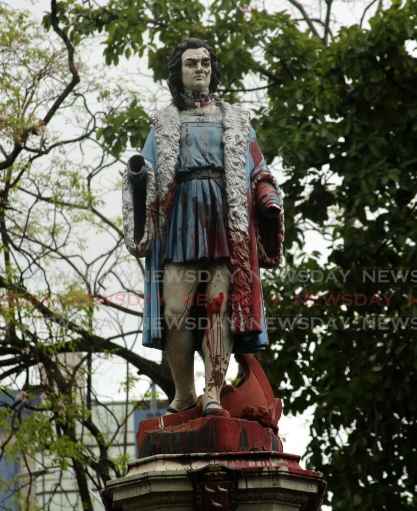 The defaced Christopher Columbus statue in Columbus Square in east Port of Spain. - File photo