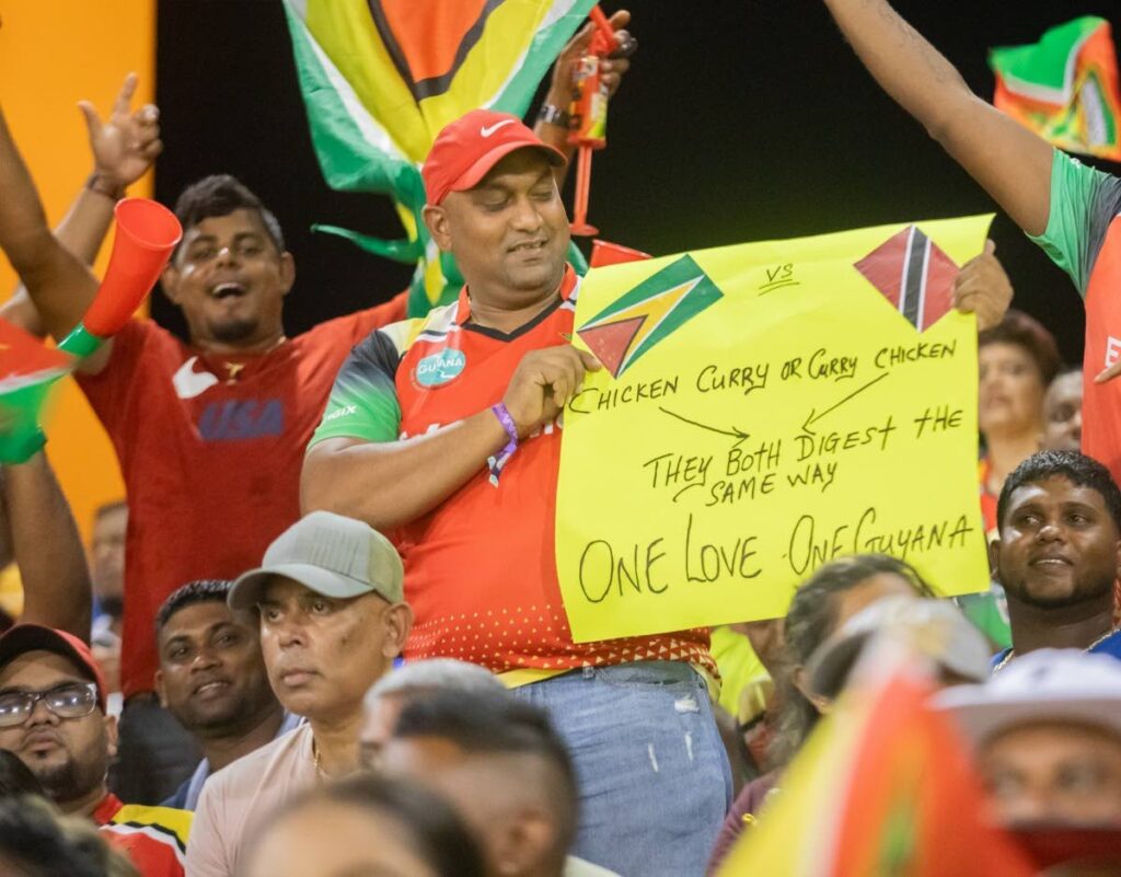 A Guyana Amazon Warriors fan has a message of unity during the 2023 CPL final between Trinbago Knight Riders and Guyana Amazon Warriors at Providence Stadium, Guyana. - Photo courtesy News Room Guyana 