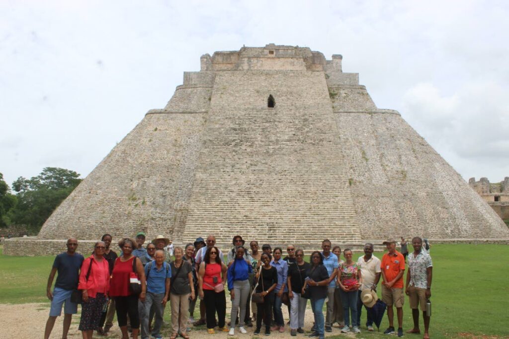 A group photo in front of the Great Pyramid of the Magician, Uxmal Yucatan - 