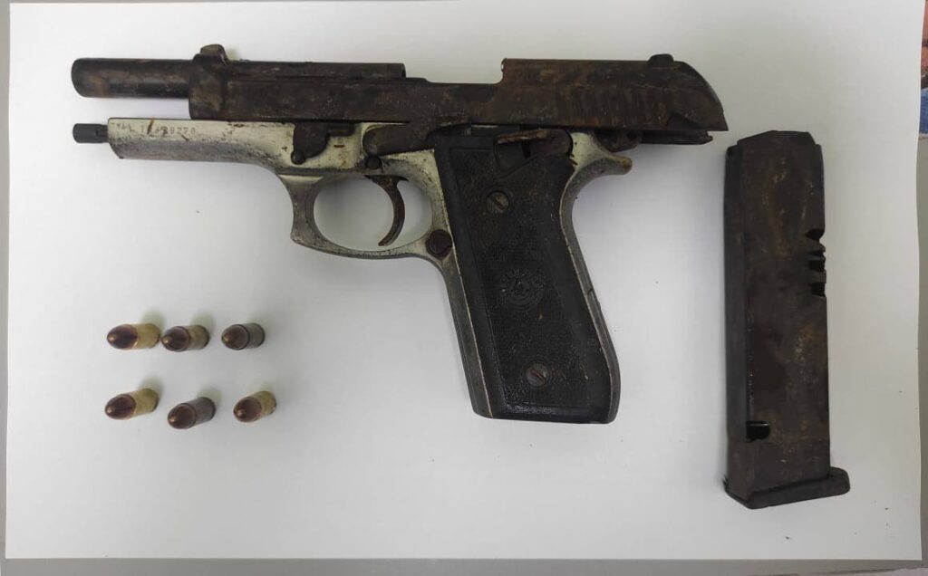 A Taurus 9mm pistol with magazine and ammunition found during a police exercise in Manzanilla. -