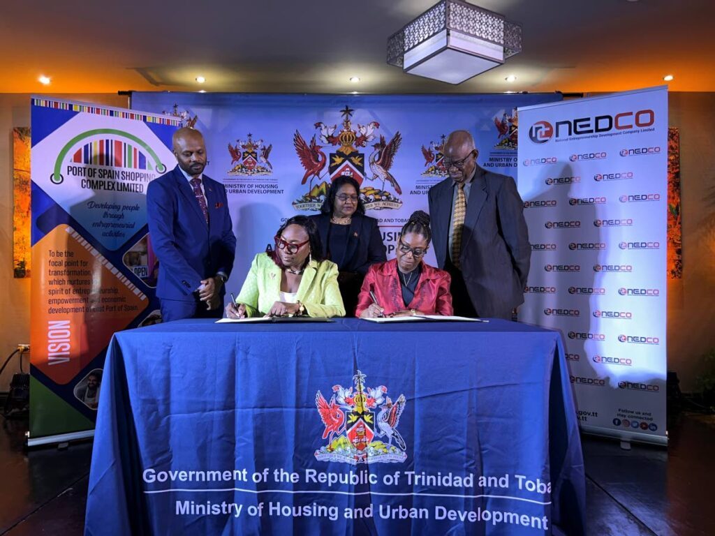 The signing of the MoU between NEDCO and the POSSCL at a joint ceremony at the Authorities Campus Plaza, Port of Spain on September 4. - Express by Enrique Rupert