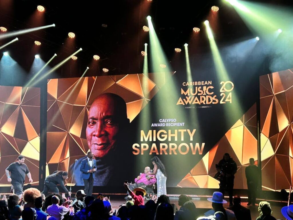 Mighty Sparrow reciving his honouree award at the 2024 Caribbean Music Awards. - 