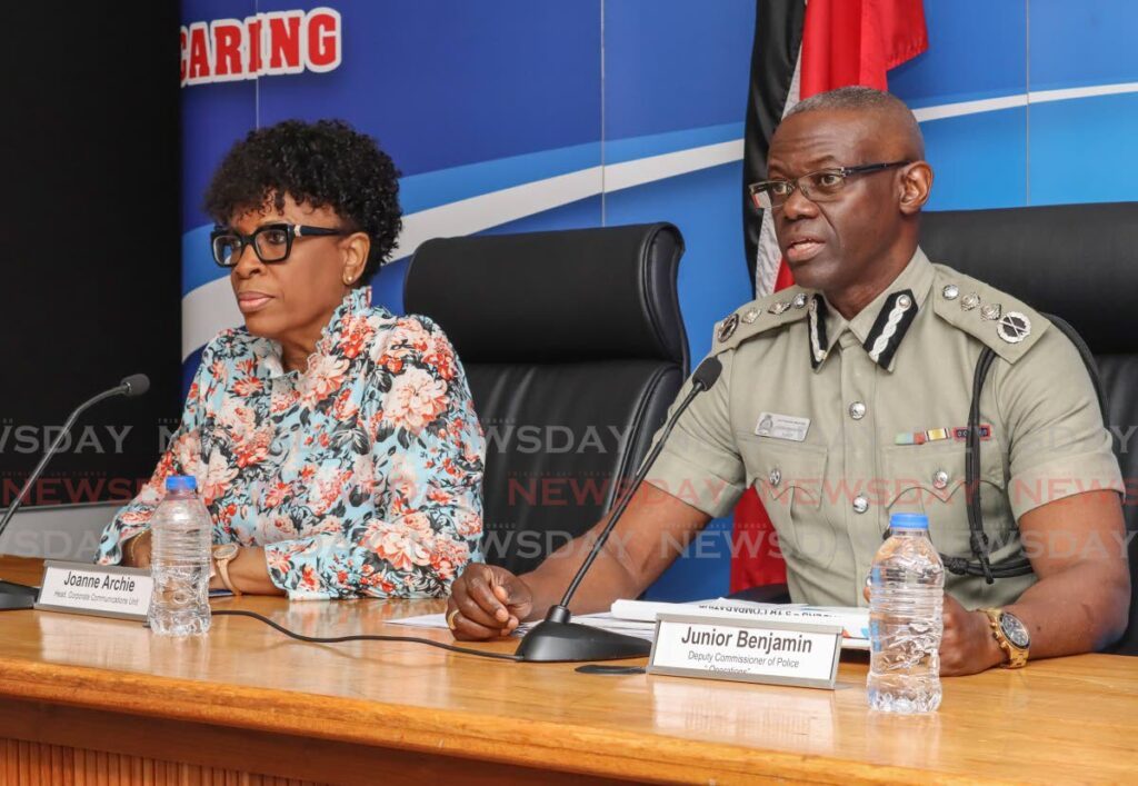 Deputy Commissioner of Police Operations Junior Benjamin with head of the police corporate communications unit Joanne Archie at a media briefing at the Police Administrative Building, Sackville Street, Port of Spain on September 5.  - Photo by Gabriel Williams