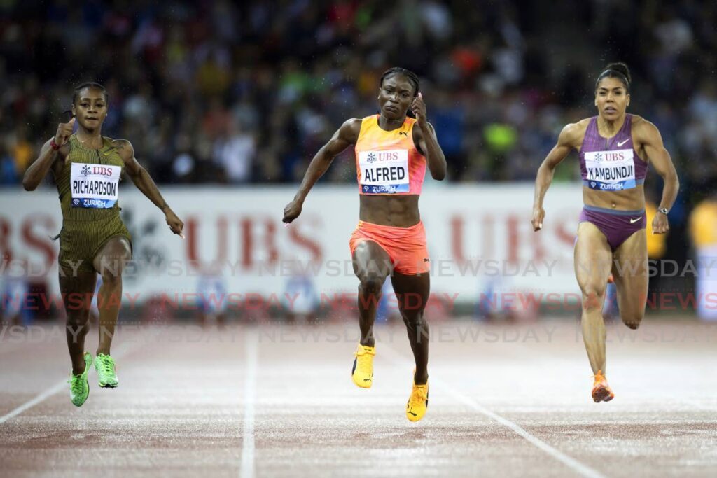 Sha'Carri Richardson of the US, left, Julien Alfred of St Lucia, middle, and Mujinga Kambundji of Switzerland, compete in the women's 100-metre race during the World Athletics Diamond League Weltklasse Zurich athletics meeting at the Letzigrund Stadium in Zurich, Switzerland on September 5. - AP PHOTO