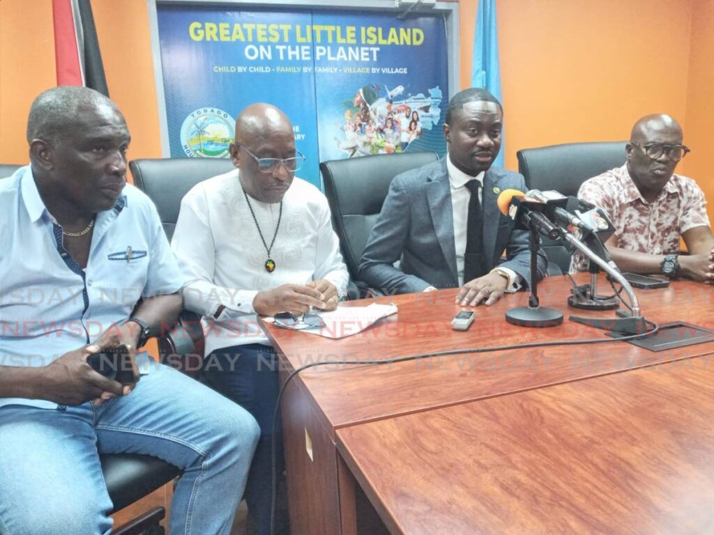 Chief Secretary Farley Augustine, second from right, at a media conference at Shaw Park on September 6, lending support to Infrastructure Secretary Trevor James, second from left, whose home was searched by police on September 5. Also present are assemblymen Ian Pollard, left, and Terrence Baynes. - Photo by Corey Connelly