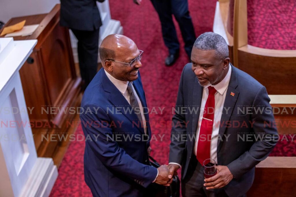 Opposition Senator Wade Mark, left, greets Minister of Digital Transformation Hassel Bacchus in the Senate on September 9. The Senate's new term began on September 13. - File photo by Jeff K Mayers