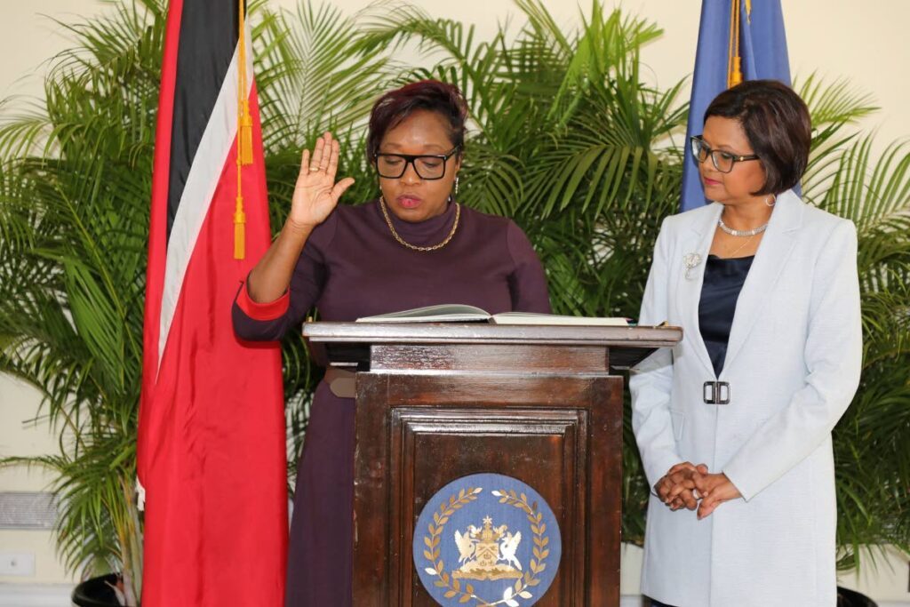 Gillian Wolffe-O’Neal takes her oath of office as a member of the Integrity Commission with President Christine Kangaloo at President's House on September 10.  - Photo courtesy The Office of the President