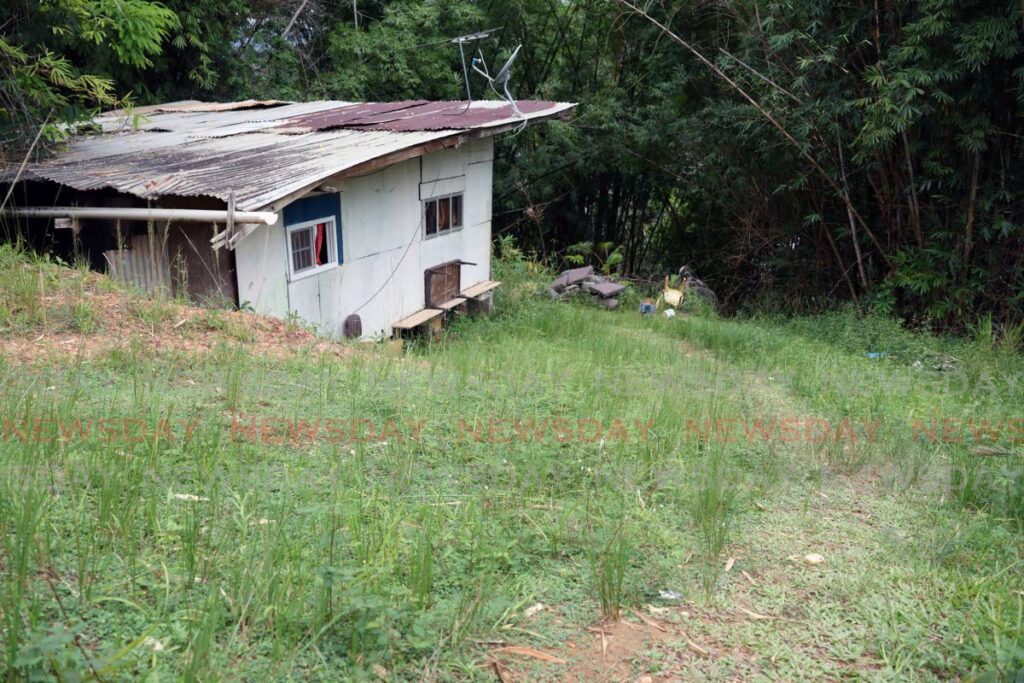 Marlon Lee, Salina Rodriguez and Malick Lee were shot dead in their home on the night of September 9 in Upper Pioneer Drive, Petit Valley. Photo taken on September 10. - Photo by Venessa Mohammed